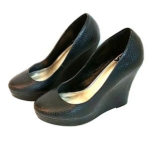 Fergalicious black wedges